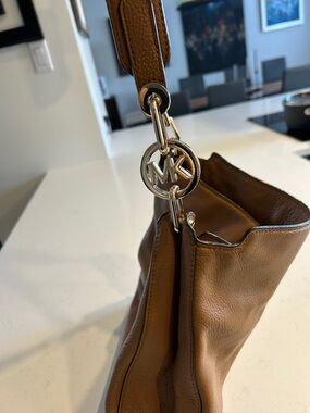 Michael Kors Cognac Leather Shoulder Hobo with Silver MK Charm